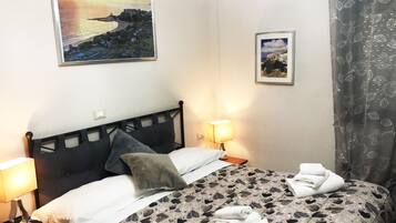 1 kamar tidur, seprai premium, minibar, dan brankas