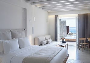 The Coast Beachfront Suite with Jetted Tub | Living area - The Coast Bill&Coo - Adults Only (Mykonos)