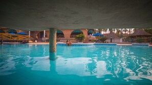 Outdoor pool, pool umbrellas, sun loungers