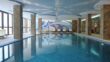 Indoor pool, open 10:30 AM to 8:00 PM, pool loungers, lifeguards on site