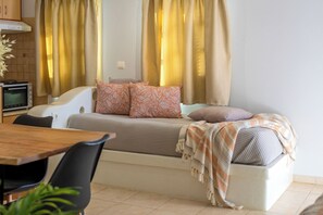 Deluxe Apartment | Living area | TV - Sahara Beach Apartments (Naxos)
