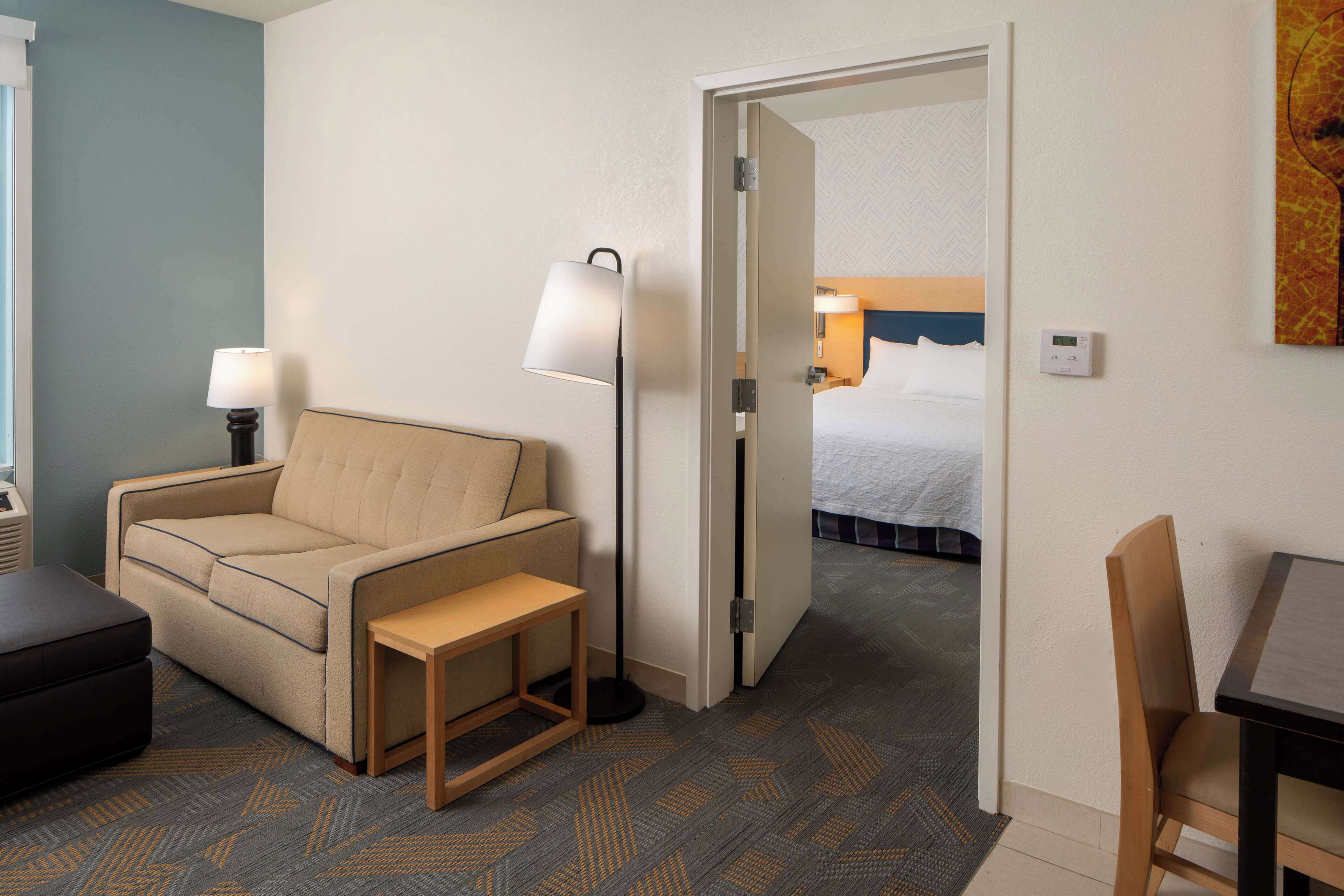 suite, 1 king bed, accessible, bathtub (mobility & hearing) | living area | 42-inch lcd tv with cable channels, tv, mp3 dock