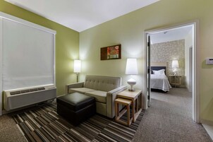 Suite, 1 King Bed with Sofa bed, Accessible, Non Smoking (Roll In Shower) | Living area | 42-inch LCD TV with cable channels, TV, MP3 dock