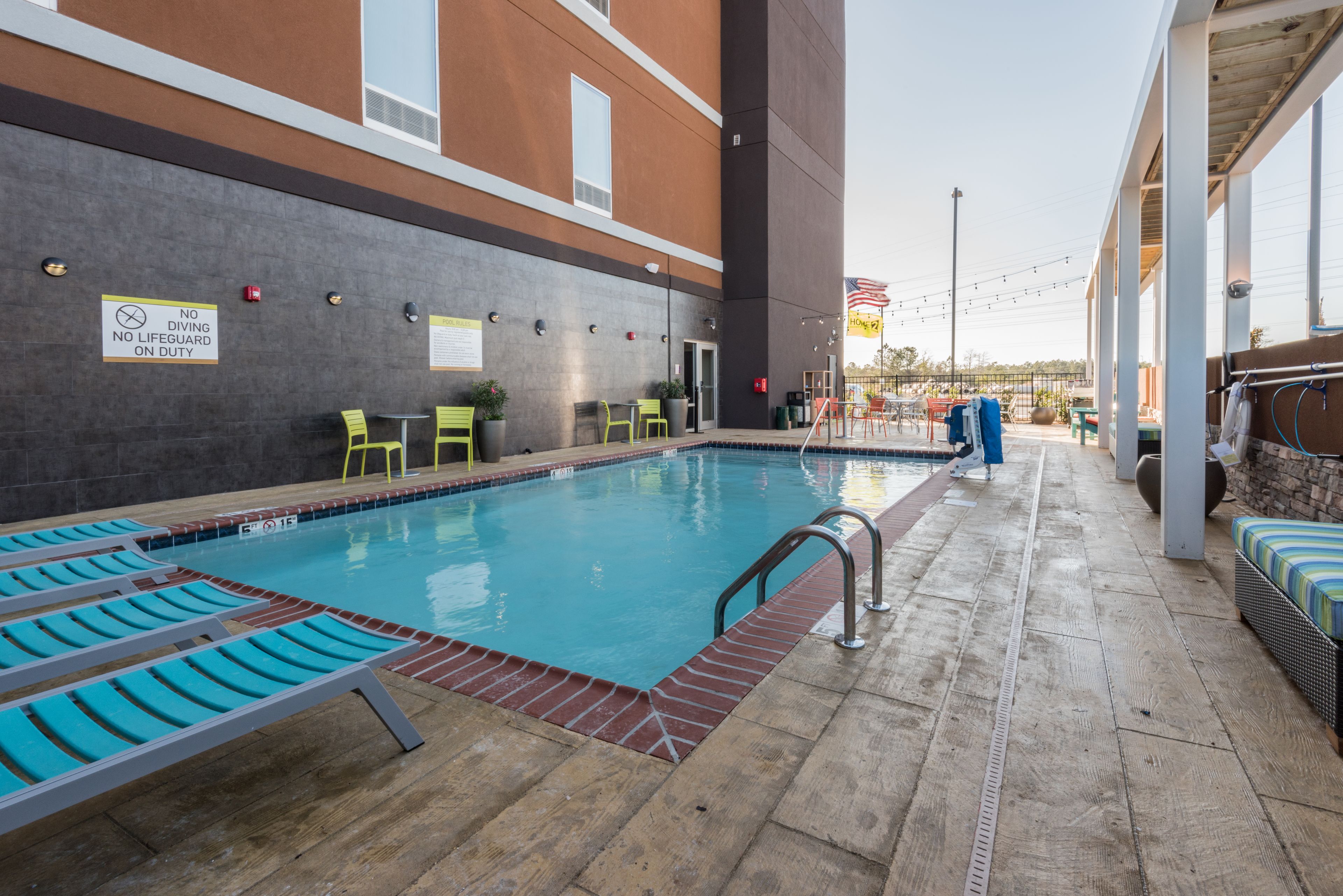 outdoor pool, pool umbrellas, pool loungers