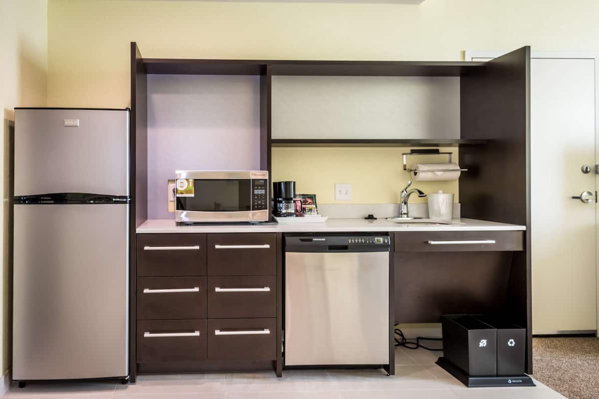 full-sized fridge, microwave, dishwasher, coffee/tea maker