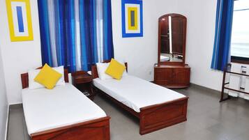 Premium bedding, desk, iron/ironing board, rollaway beds