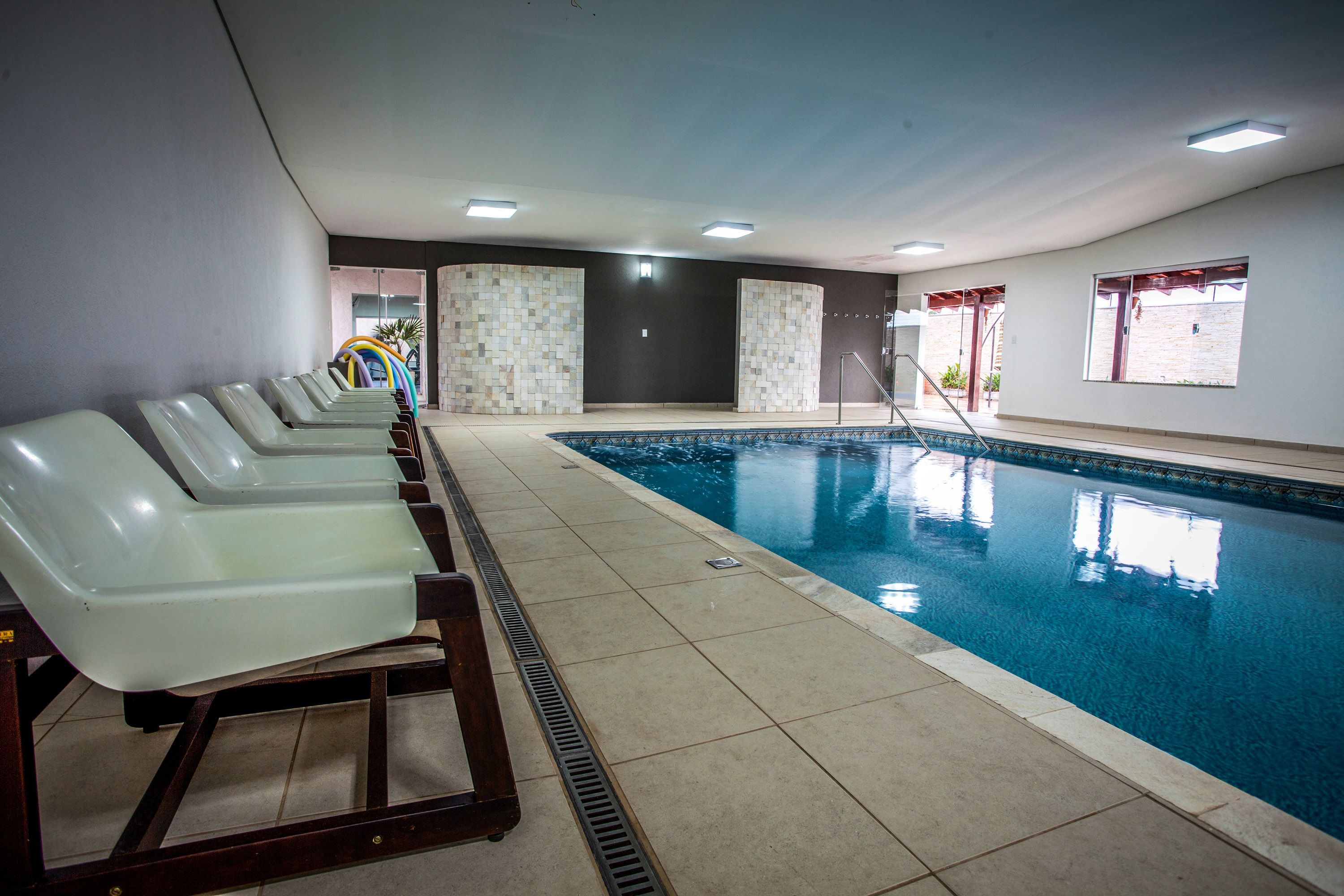indoor pool, outdoor pool, pool loungers