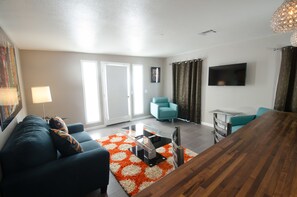 Exclusive Suite, 1 King Bed, Patio, Poolside | Living room