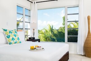 Luxury Suite, 2 Bedrooms | In-room safe, individually furnished, iron/ironing board - The Oasis at Grace Bay (Providenciales)