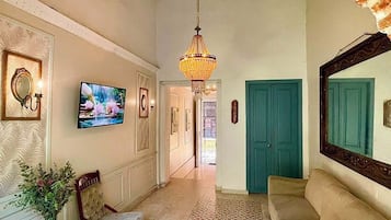 Superior Room, 1 King Bed with Sofa bed | Living area | Flat-screen TV