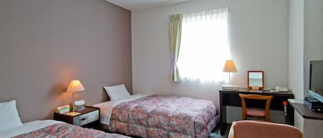 Copriletto in piuma, una cassaforte in camera, tende oscuranti