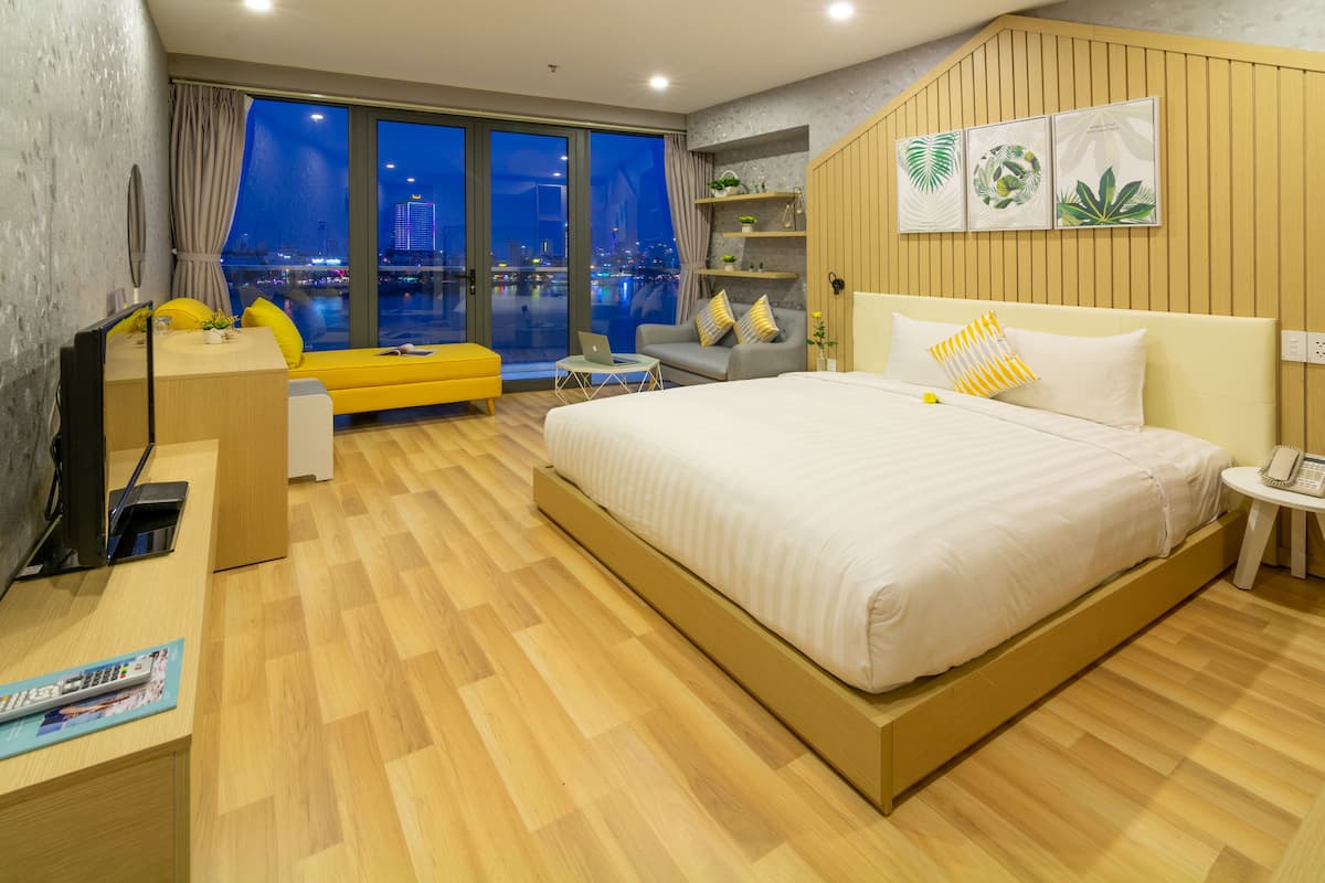 Luxury Double Room, Balcony, River View | Minibar, desk, laptop workspace, blackout curtains