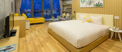 Luxury Double Room, Balcony, River View | Minibar, desk, laptop workspace, blackout curtains