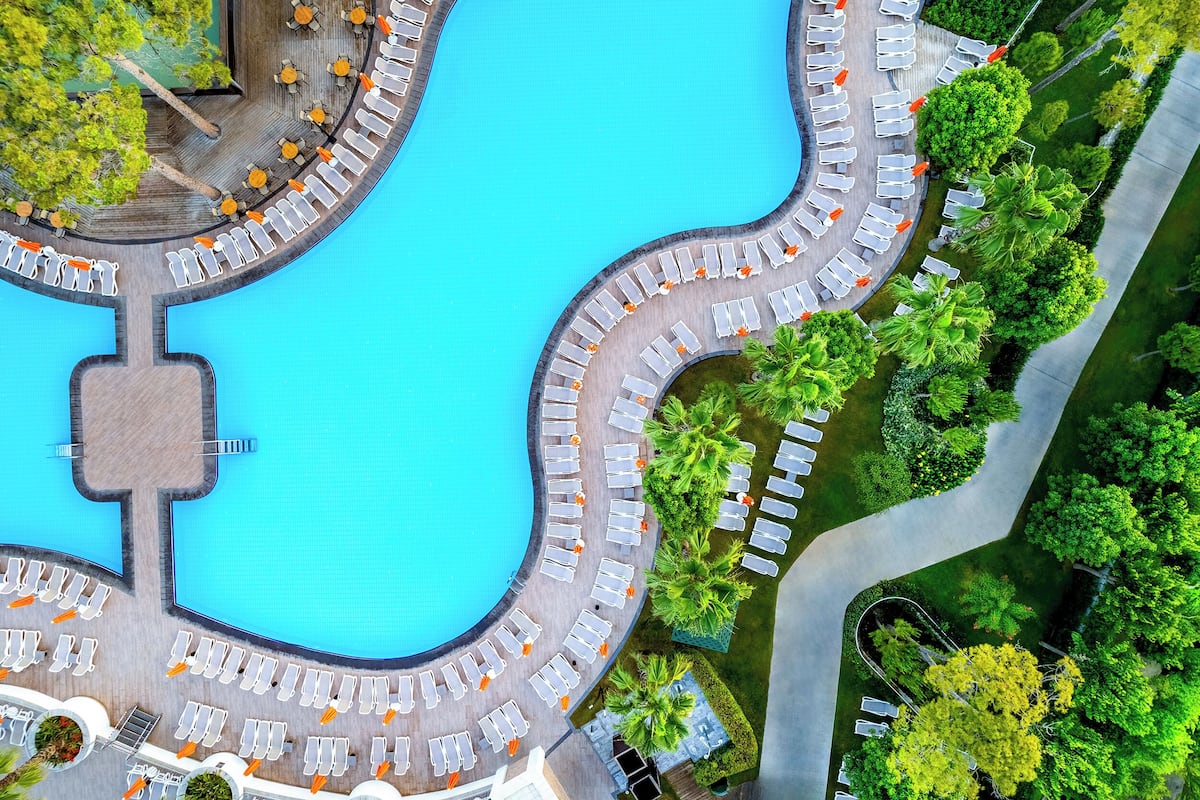 indoor pool, outdoor pool, open 8:00 am to 7:00 pm, pool umbrellas