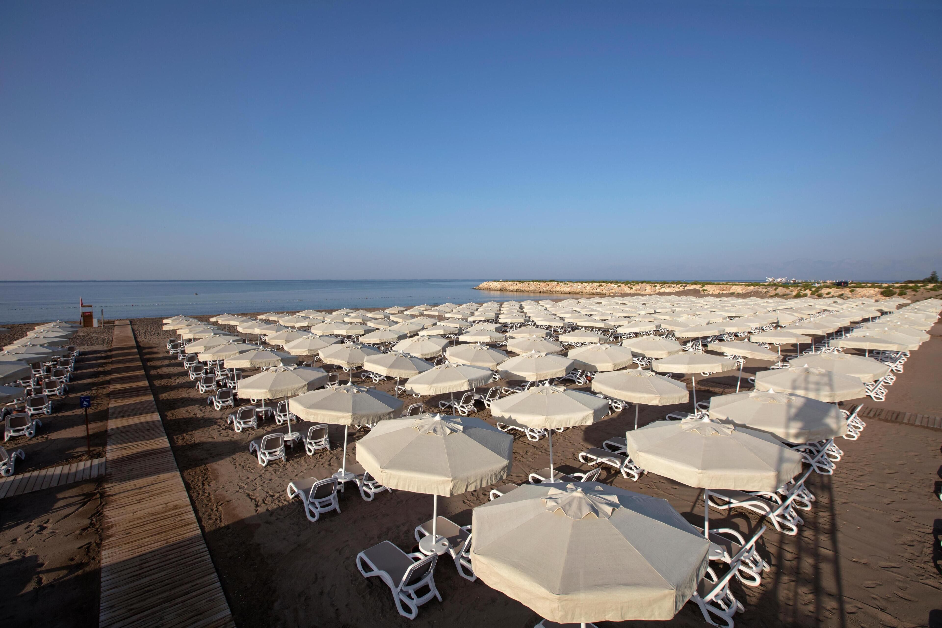 Private beach nearby, free beach shuttle, sun loungers, beach umbrellas