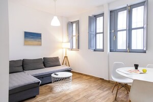 Apartemen, 1 kamar tidur | Area keluarga | TV
