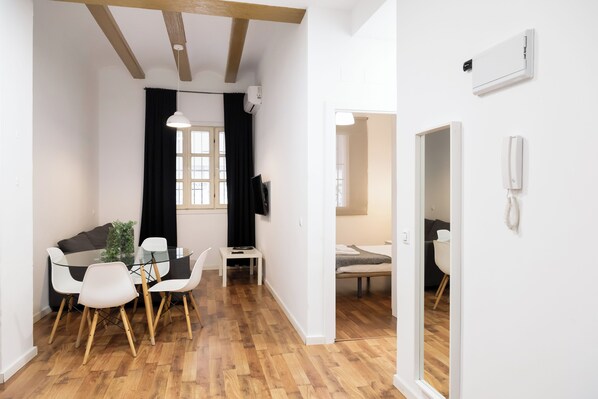 Apartment, 1 Bedroom | Living area | TV