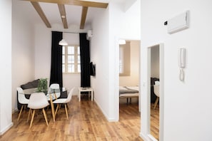 Apartment, 1 Bedroom | Living area | TV