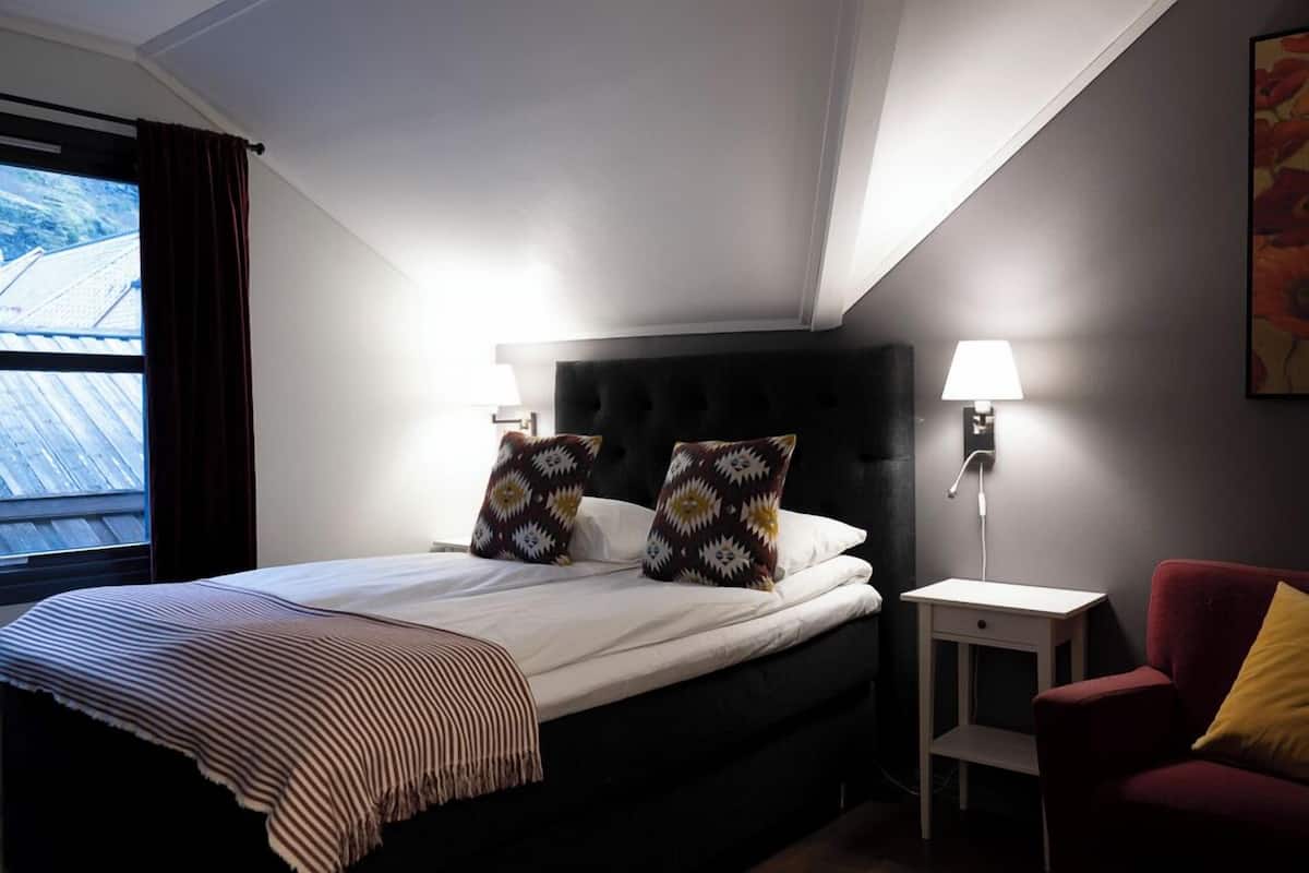 Economy Twin kamer | 1 slaapkamer, een minibar, verduisterende gordijnen