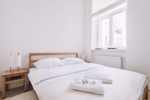 Apartment, 1 Bedroom (Street Pilsudskiego 11) | Iron/ironing board, cribs/infant beds, travel crib, free WiFi - EchoDom 3 Apartments (Kraków)