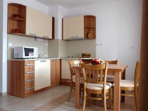 Apartment, 1 Bedroom, Balcony | In-room dining - Winslow Highland (Bansko)