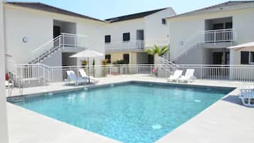 Classic Apartment, 2 Bedrooms | Pool | Seasonal outdoor pool, pool umbrellas, pool loungers