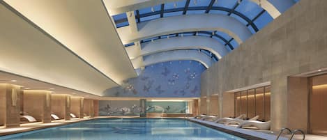 Indoor pool, pool umbrellas, sun loungers