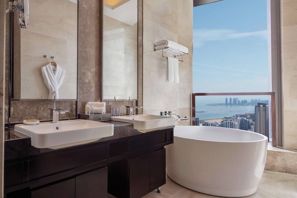 king two bedroom apartment ocean view | bathroom | separate bathtub and shower, deep-soaking bathtub, rainfall showerhead