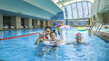 Indoor pool, pool umbrellas, sun loungers