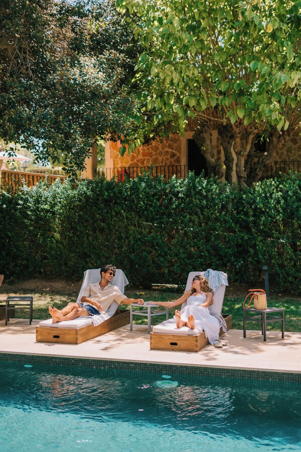 Outdoor pool, pool umbrellas, pool loungers