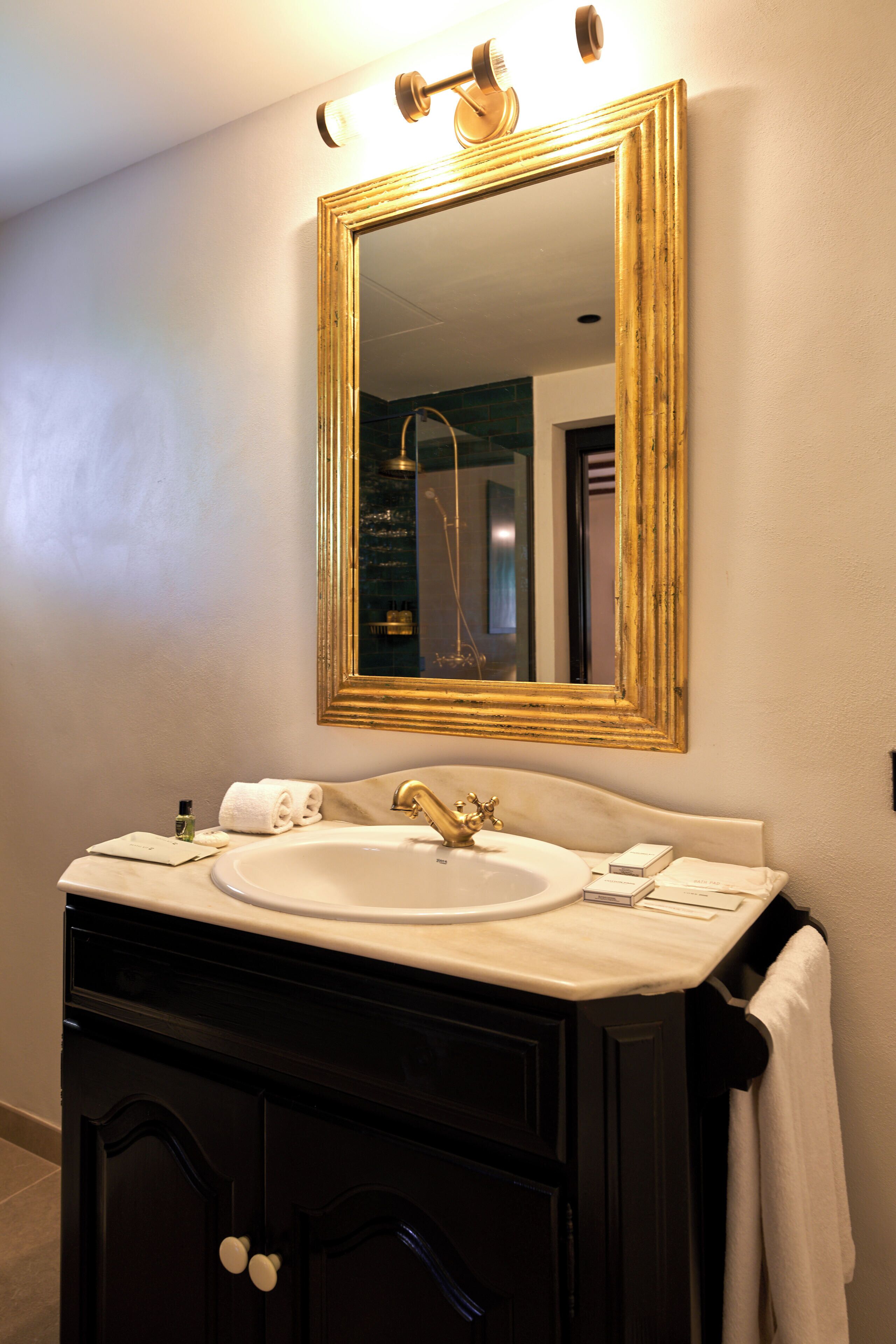 deluxe double room | bathroom | shower, rainfall showerhead, hair dryer, bathrobes