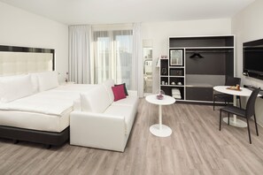 Hypo-allergenic bedding, free minibar, in-room safe, desk