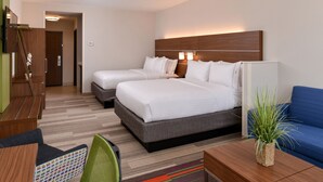 A hotel room with two beds, a desk, a chair, and a sofa. - Holiday Inn Express & Suites Salem by IHG (Salem)
