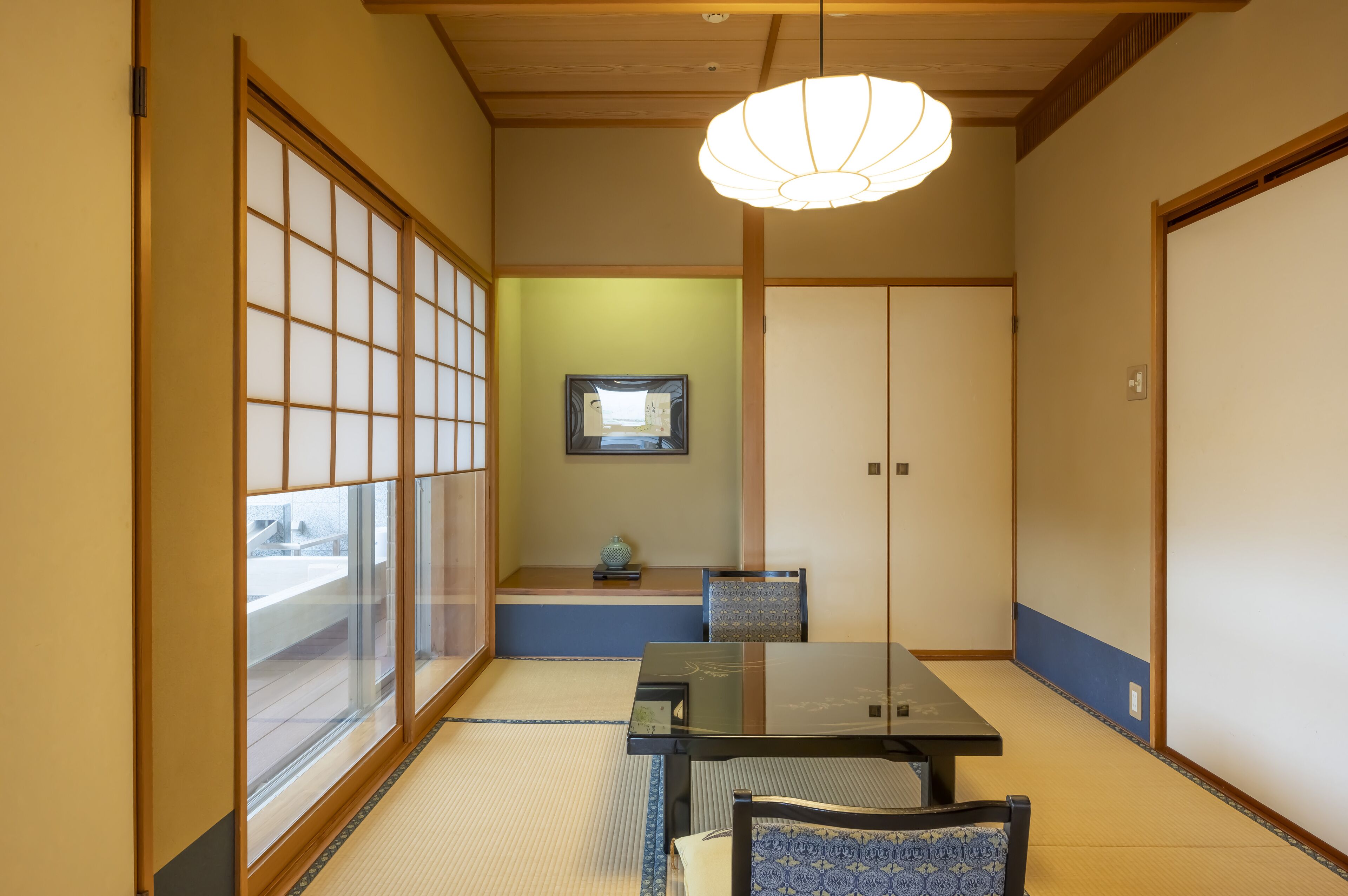 Premium bedding, desk, laptop workspace, iron/ironing board