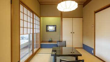 Premium bedding, desk, laptop workspace, iron/ironing board