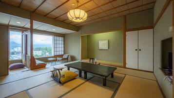 Premium bedding, desk, laptop workspace, iron/ironing board