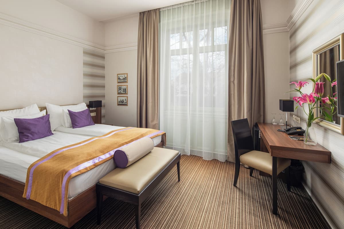 Superior Double or Twin Room | Minibar, in-room safe, desk, soundproofing