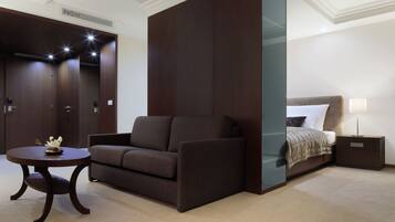 Triple Room | Living area | TV