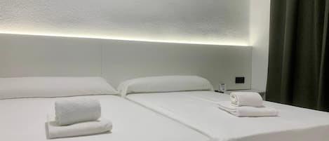 Double or Twin Room | Desk, blackout drapes, free WiFi, bed sheets