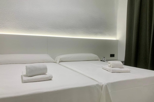 Double or Twin Room | Desk, blackout drapes, WiFi (free), bed sheets
