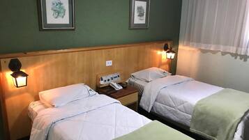 Minibar, desk, blackout curtains, iron/ironing board