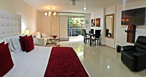 Suite junior, 4 habitaciones | Caja fuerte, escritorio, wifi gratis y ropa de cama