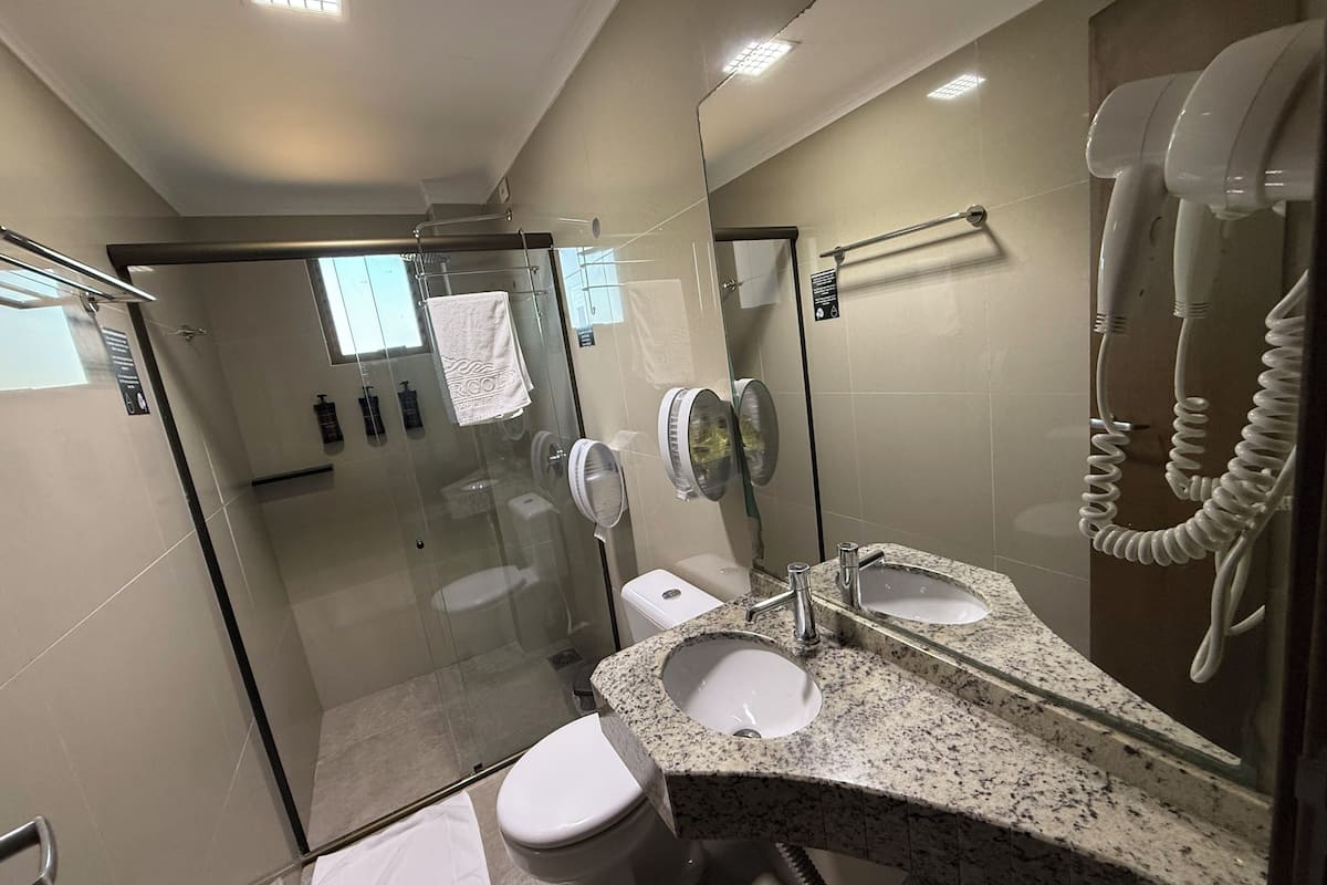 executive quadruple room | minibar, in-room safe, desk, laptop workspace