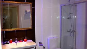 Shower, free toiletries, hair dryer, slippers
