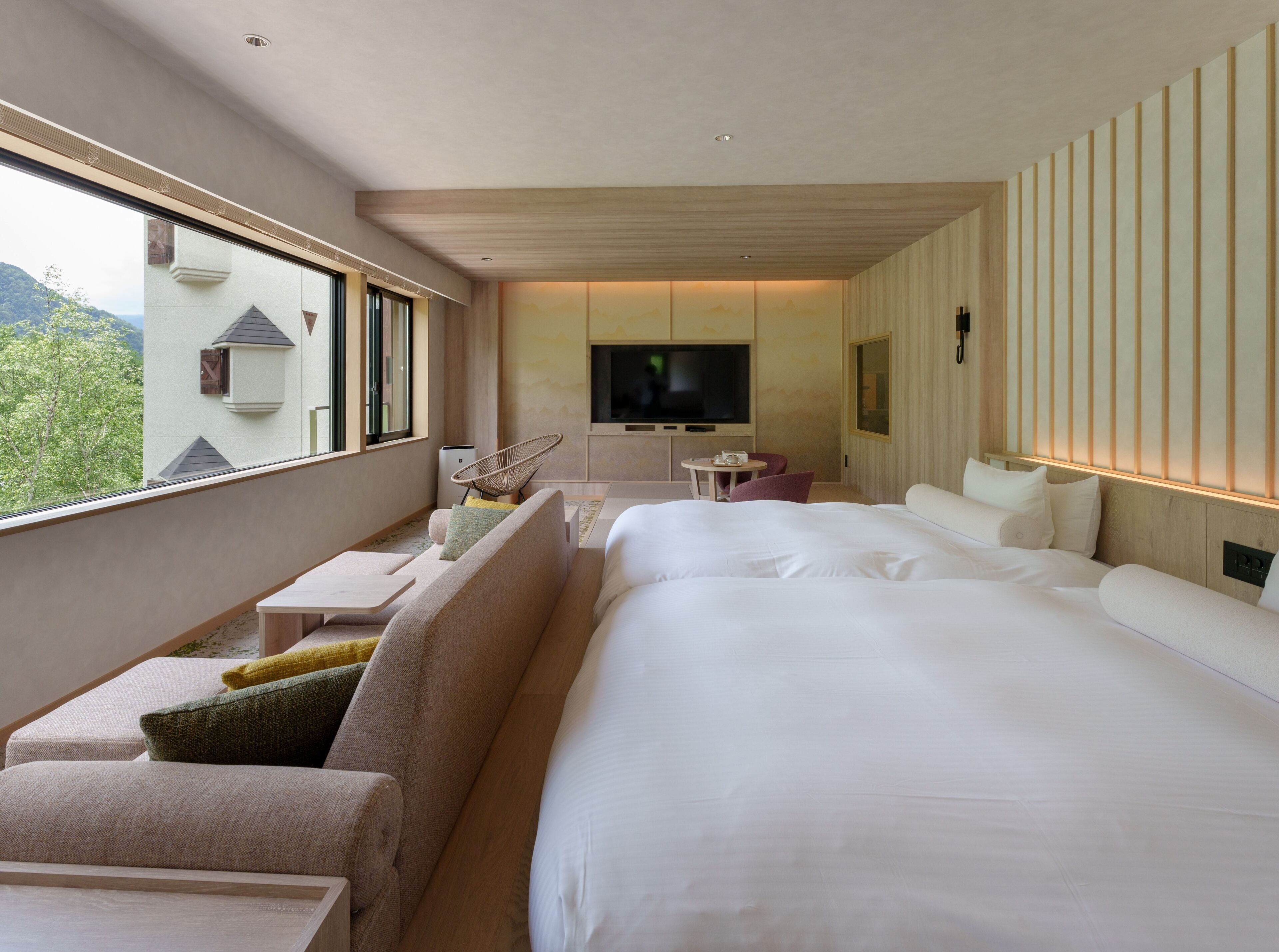 family quadruple room, non smoking, river view | down duvets, in-room safe, desk, free wifi