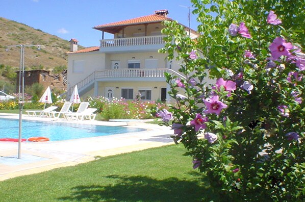 Indoor pool, outdoor pool, pool umbrellas, pool loungers