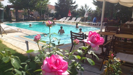 Indoor pool, outdoor pool, pool umbrellas, sun loungers