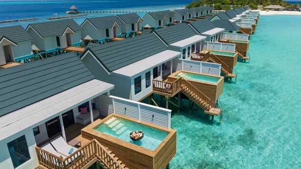 Overwater bungalows with private pools, wooden walkways, and ocean views. - OBLU NATURE Helengeli - All-Inclusive with Free Transfers (Helengeli)