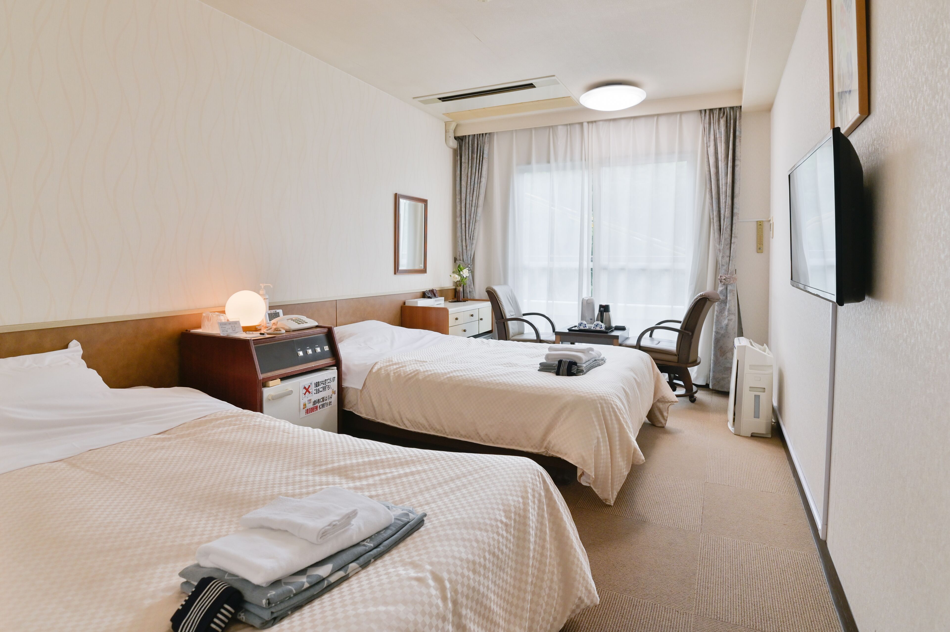 main/south building - japanese style room (run of the house) | iron/ironing board, bed sheets