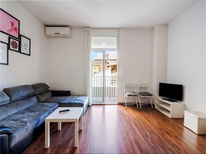 Deluxe Duplex | Living room | Flat-screen TV - Luxury Apartments Puerto Valencia (Valencia)